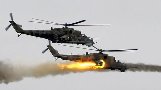 Картинка: Высший пилотаж: Русские вертолеты Ми-28 отработали по позициям боевиков в Сирии. 